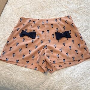 High waisted pink shorts with bow detail